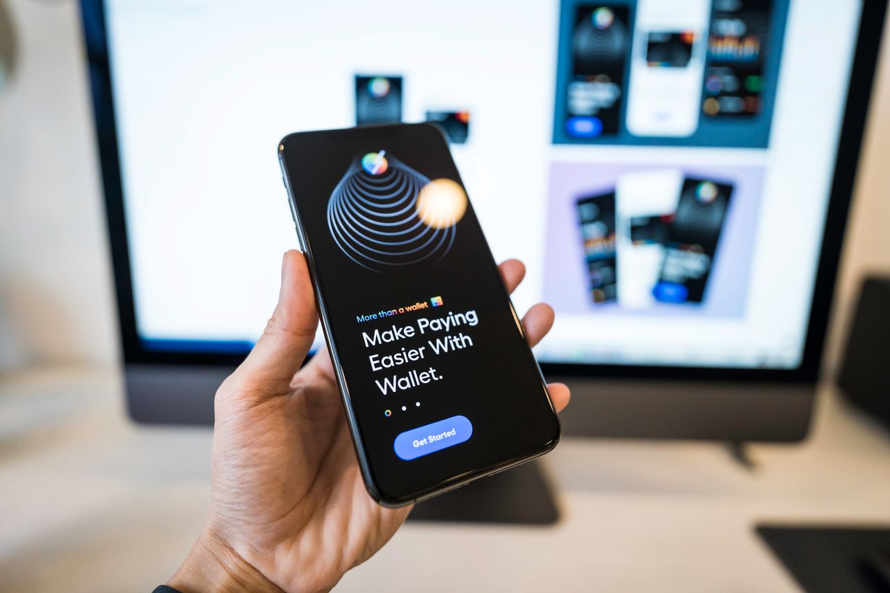 A member checking their wallet balance on a phone